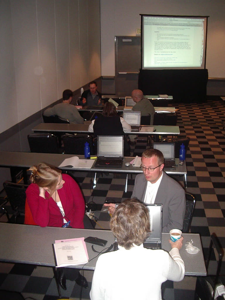 Operations team collaborating in a corporate office